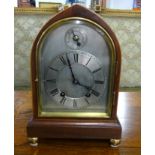 A mahogany cased 'ting tang' chiming bracket clock with pendulum and key, height 27cm.
