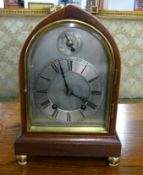 A mahogany cased 'ting tang' chiming bracket clock with pendulum and key, height 27cm.