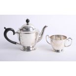 A George V silver bachelor's teapot, Sheffield, HW, and a similar matching sucre, approx 13.90 oz.