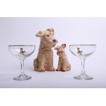 Two Sylvac terrier dogs and two Babycham glasses.