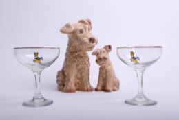 Two Sylvac terrier dogs and two Babycham glasses.