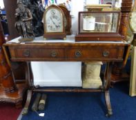 A reproduction mahogany sofa table fitted with two drawers and two dummy drawers.