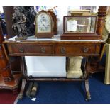 A reproduction mahogany sofa table fitted with two drawers and two dummy drawers.