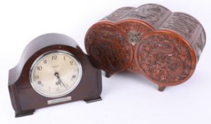 A sandalwood carved Oriental table chest and a 1940's wood cased mantle clock with chiming