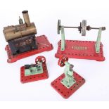 Mamod, stationary engine and three other parts.