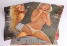 A collection of 1980s'Pin Up' calendars.