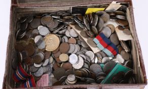 Quantity of general mixed coinage and some medals in a small leather case.