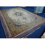 Antique Persian Tabriz style carpet, stylised floral design on camel ground, 391cm x 256cm.