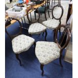 Four Victorian balloon back dining chairs.