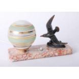 An art deco lamp, bronze? seagull with glass ball.