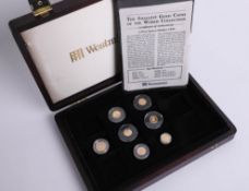 Six various small gold coins of the world collection seven sorted miniature 24ct gold coins