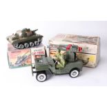 Marx battery operated firing tank model boxed together with a Japanese plastic Army jeep boxed (2)