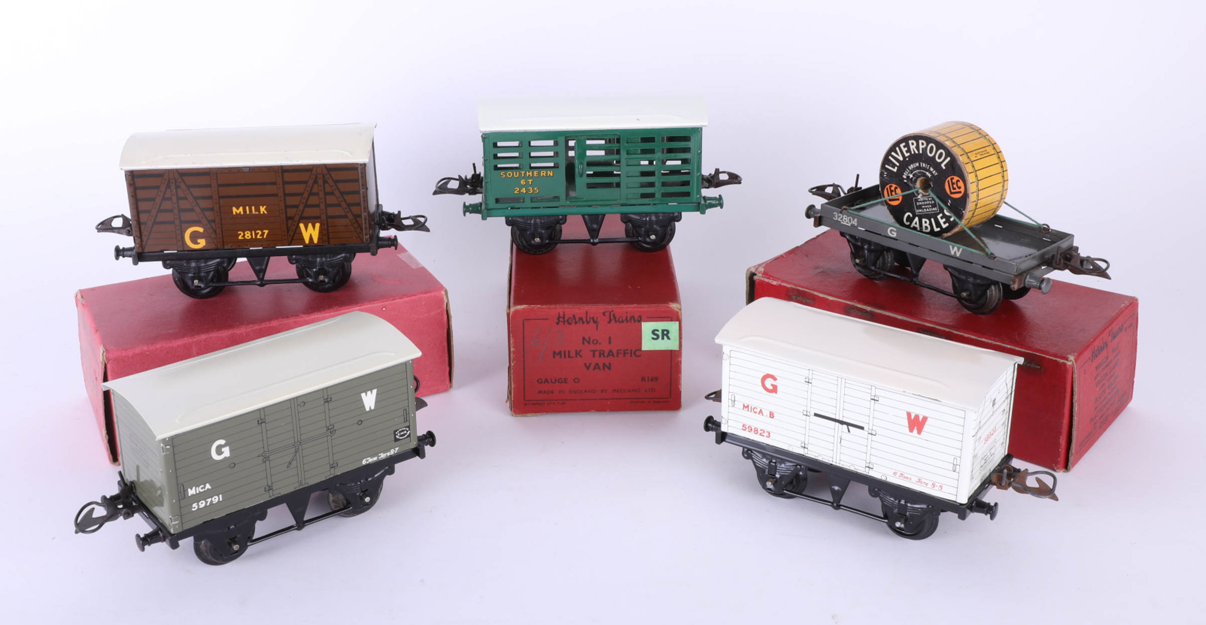 Hornby Gauge, five assorted trucks including Flat truck with cable drum GW, No 0 Milk traffic van