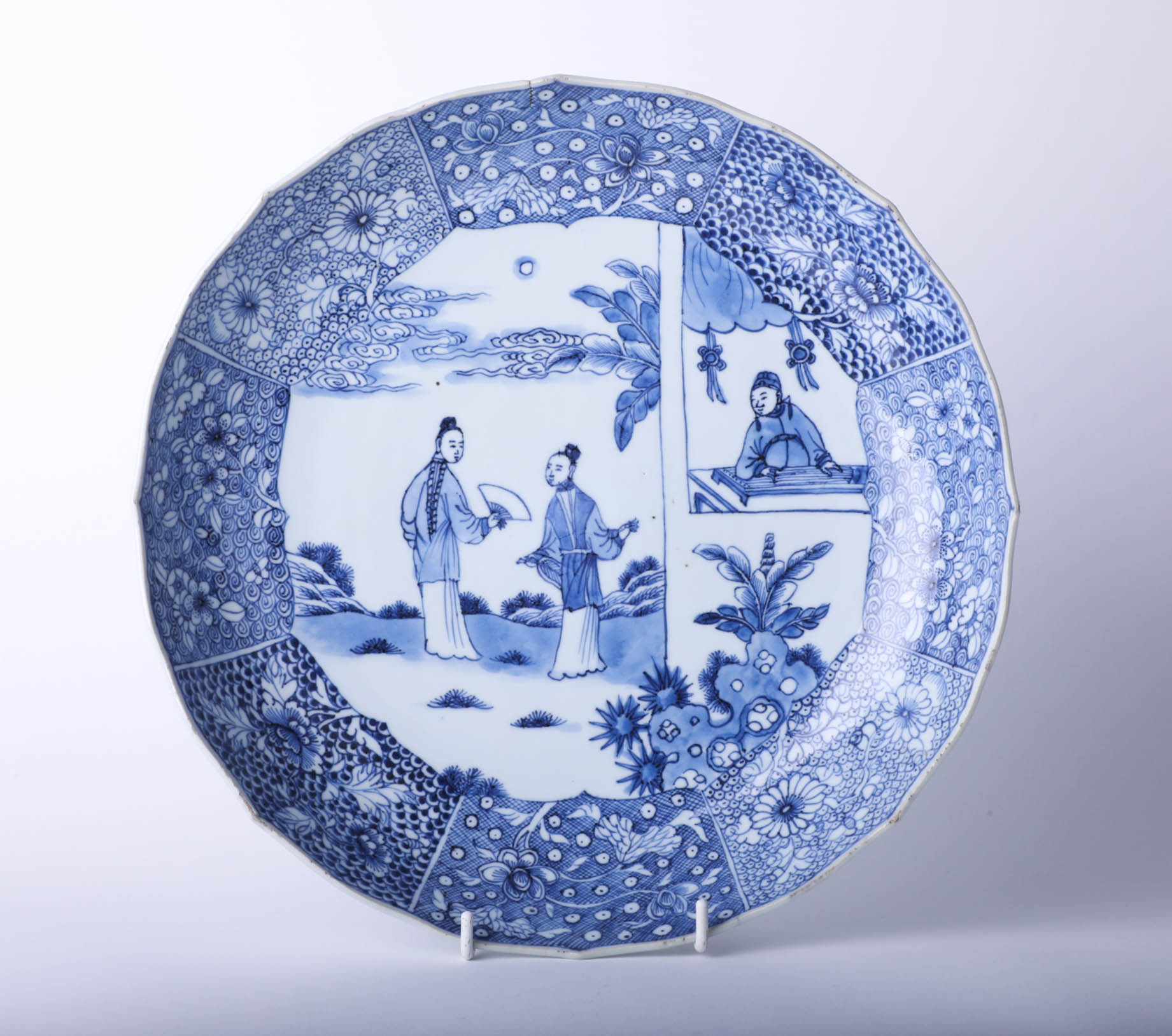 Antique Chinese porcelain blue and white shallow dish decorated with figures on the underside