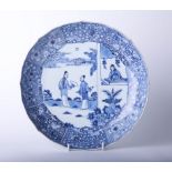 Antique Chinese porcelain blue and white shallow dish decorated with figures on the underside
