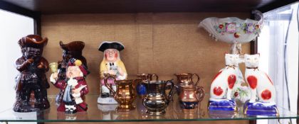 A quantity of ceramic jugs and figures including seven copper and lustre jugs and mugs, four various