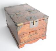 An oak and brass band shaving box fitted with mirror and drawer, length 32cm and width 21cm.