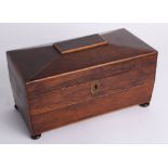 A Victorian mahogany tea caddy.