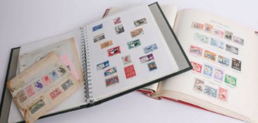 Large trunk containing numerous stamps in three albums, tins, boxes, packets including British