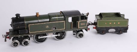 A GWR O gauge clockwork 'LNER 5154' locomotive, 2221 and a LMS tender.
