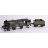 A GWR O gauge clockwork 'LNER 5154' locomotive, 2221 and a LMS tender.