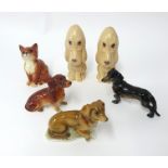 Two Sylvac dogs, and a Beswick cat, and three other animal ornaments.