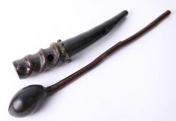A carved African blowing horn together with Shillelagh stick. (2)