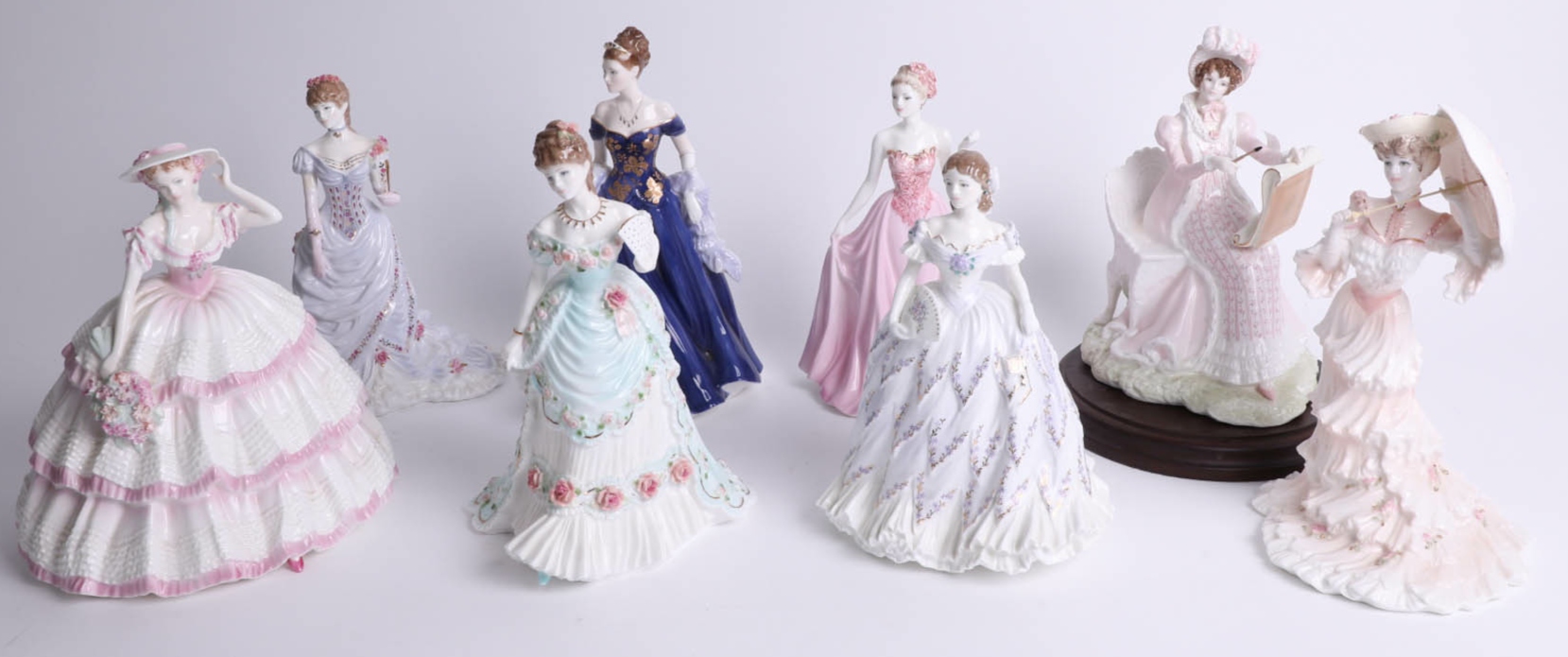 Eight modern porcelain figures including Coalport, Park Lane collection and Four Flowers
