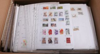 Large box of world stamps hundreds of album pages.