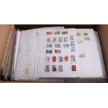 Large box of world stamps hundreds of album pages.