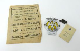AA badge with keys etc. together with a Titanic disaster newspaper memoriam.