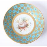 An 18th century French Vincennes porcelain dish decorated with gilt work and shells on a turquoise