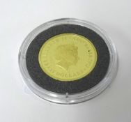 A Perth Mint Australian 2013 gold sovereign.