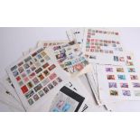 Two boxes of stamps on hundreds of album pages including British Commonwealth.
