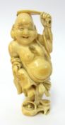 Carved antique Japanese ivory figure of Hoite, signed to base, height 13cm.