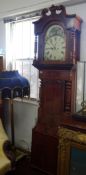 A Victorian mahogany longcase clock by W.M.Errington and Company, Smethwick arch painted dial, lunar