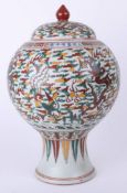 A Chinese? porcelain vase and cover, height 35cm.