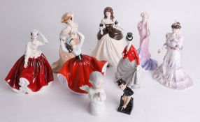 Nine porcelain figures including a miniature Doulton figure 'Jingle', Doulton figurines including