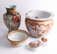 An interesting collection of china including a Clarice Cliff bowl.