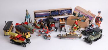 A collection of modern clockwork and tinplate toys.