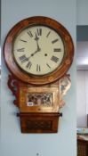 A Victorian walnut and parquetry inlaid drop dial wall clock.