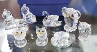A collection of small crystal ornaments.