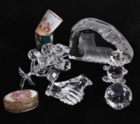 Various crystal glass ornaments including Swarovski.