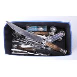 Assortment of various silver plated flatware together with a three piece carving set with ornate
