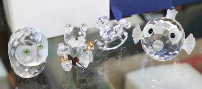 Swarovski Crystal, a collection including Owl, Teddy Bear, Rocking Horse and Puffa Fish, all boxed.