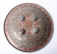 A Persian ornate shield, diameter 38cm.