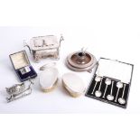 A boxed silver napkin ring, set of six silver teaspoon, pair of silver backed brushes, two