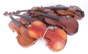 Six various vintage violins, some missing necks.