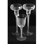 Pair of modern air twist candle holders and similar air twist wine glasses (3).