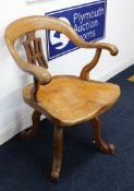 Late 19th/early 20th century oak swivel 'Captains' office chair.